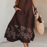 Noemia - Vestido midi de linho com bordados em estilo boho