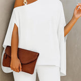 Blusa Bee Elegante, fabricada em Itália, com alça decorativa dourada
