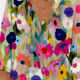 Sidsel | Blusa com flores e decote em V